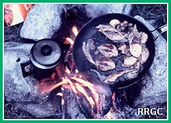 Cooking Grouse
Over Open Fire
